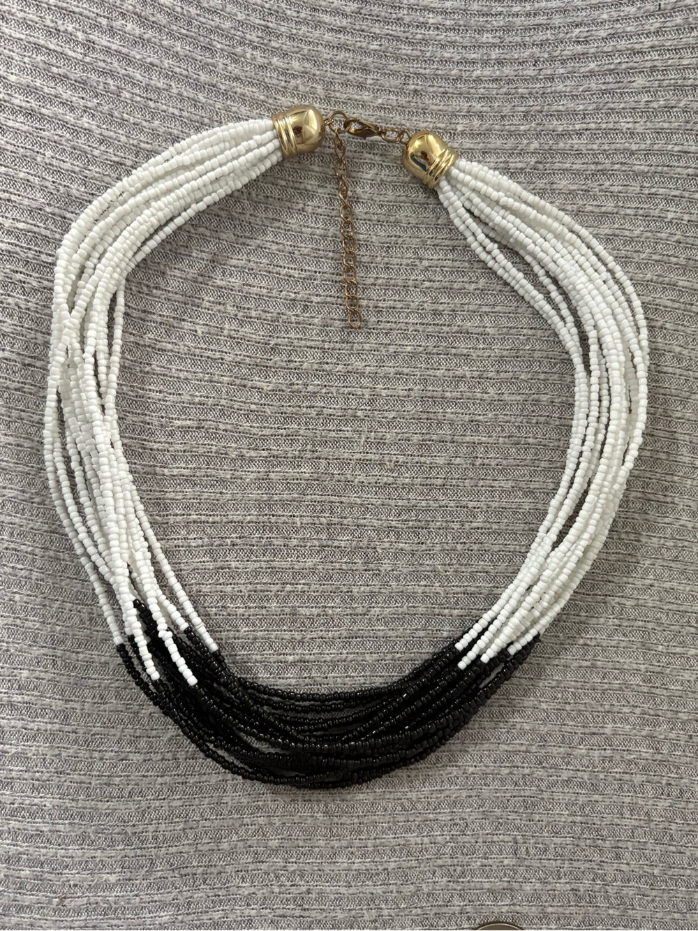 Vintage gold tone multistranded white & black beaded adjustable chain necklace